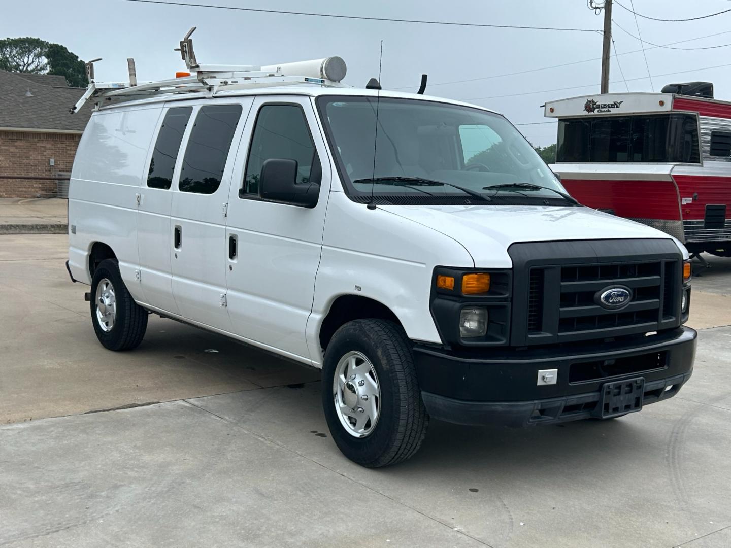 2010 White /Gray Ford E-Series Van E-250 (1FTNE2EL2AD) with an 5.4L V8 SOHC 16V engine, 4-Speed Automatic transmission, located at 17760 Hwy 62, Morris, OK, 74445, (918) 733-4887, 35.609104, -95.877060 - 2010 FORD E-SERIES VAN E-250 5.4 V8 DEDICATED CNG (COMPRESSED NATURAL GAS) DOES NOT RUN ON GASOLINE. FEATURES MANUAL SEATS, MANUAL LOCKS, MANUAL WINDOWS, MANUAL MIRRORS, AM/FM STEREO. IT IS EQUIPPED WITH A CNG FUELING SYSTEM, IT RUNS ON COMPRESSED NATURAL GAS. A PREMIER ALTERNATIVE FUEL THAT IS EXTR - Photo#2